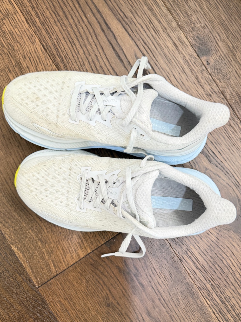Hoka Off-White Knit Running Shoe with Light Blue Insole Accent